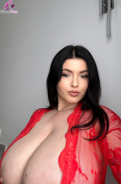 Brunette Busty Ema Shows Her Huge Breasts