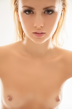 Oiled up blonde in just high heels