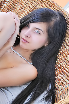 Tamara Invites A Glimpse with Playful Tease
